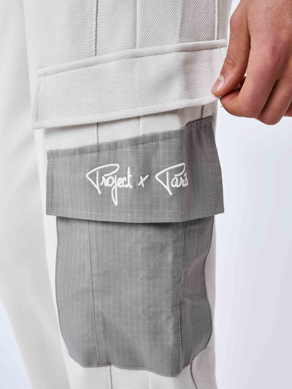 Pantalon de jogging bi-matière a poches