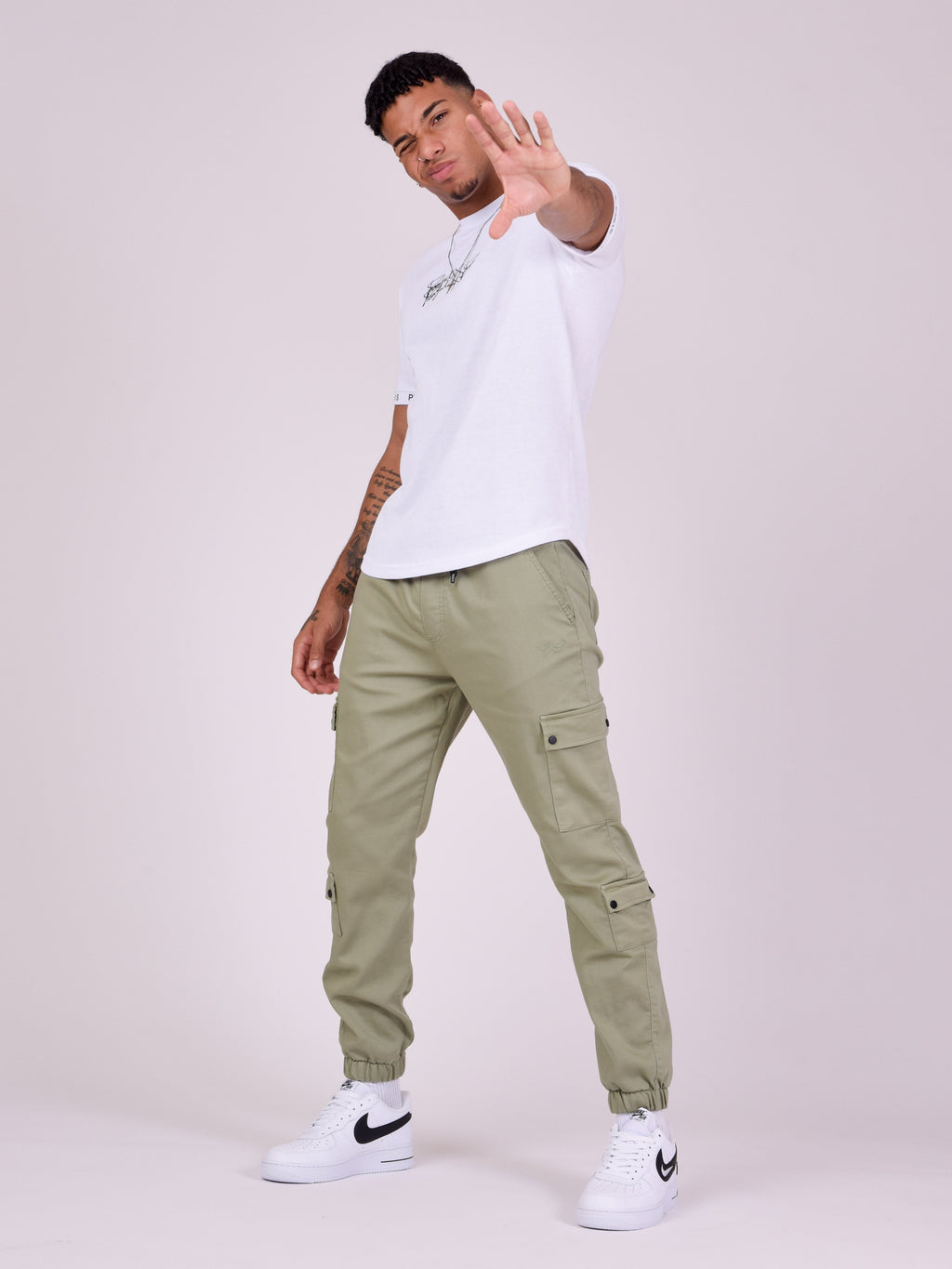 Cargo multi-poches avec serrage élastique