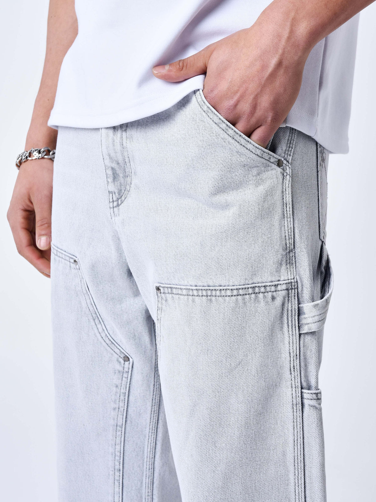 Jeans ample à détails charpentier