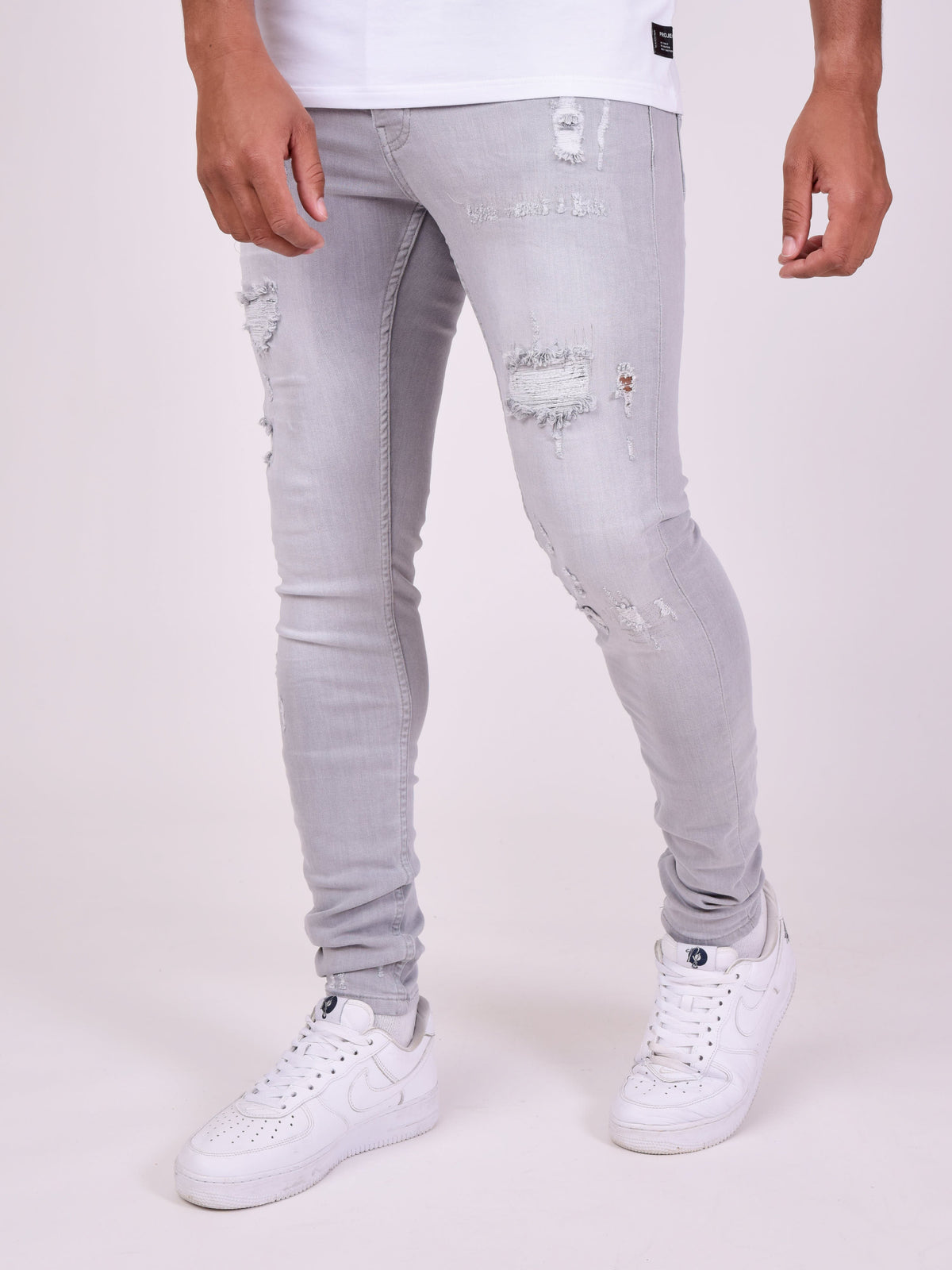 Jean skinny effet usé