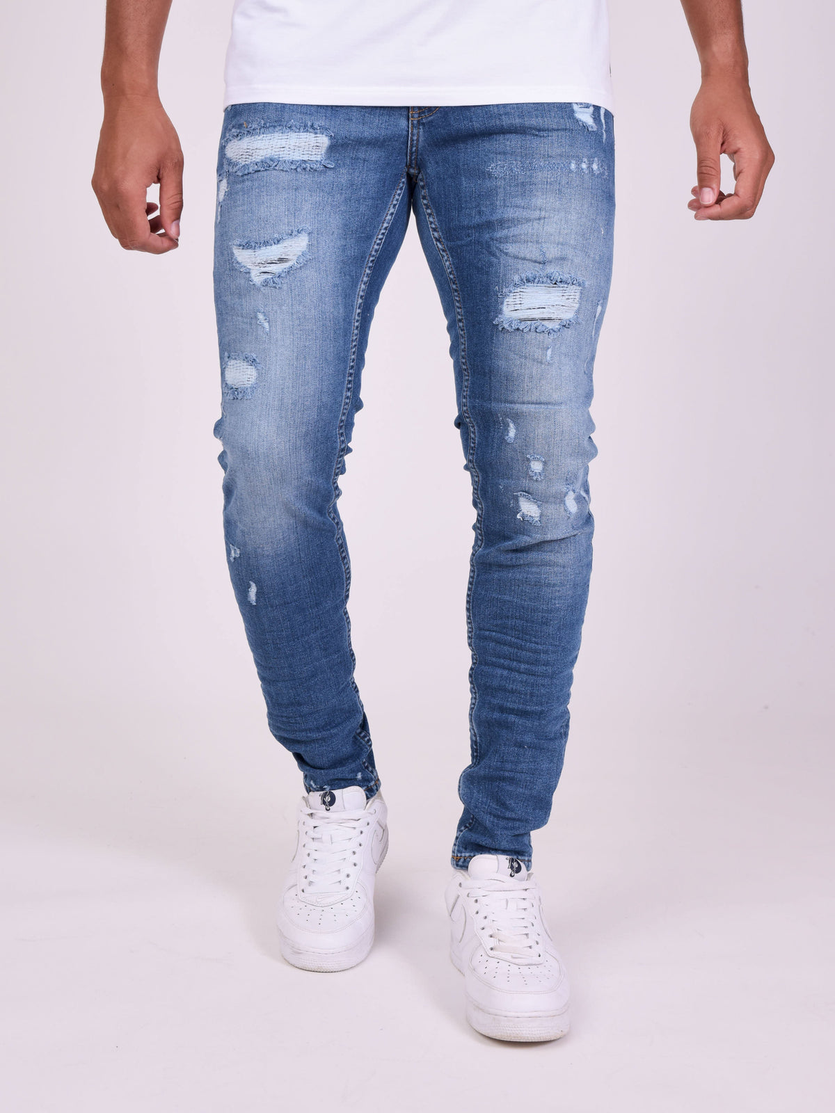Jean skinny effet usé