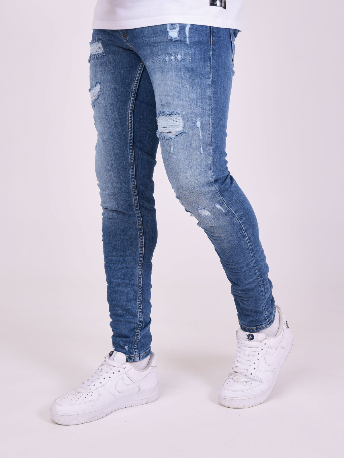 Jean skinny effet usé